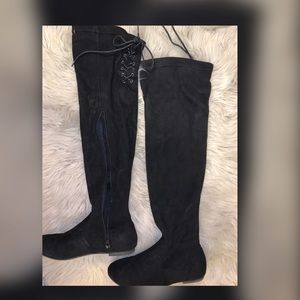 Over the knee flat boots
